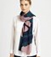 Luxurious wool and cashmere are woven together on this oversized wrap with a bold, double-sided swan print.50% cashmere/50% woolAbout 28 X 80Dry cleanImported