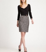 A seductive neckline meets an embellished waistline and curve-hugging skirt.V-necklineLong sleevesBack zipperAbout 24 from natural waist41% polyester/19% polyurethane/18% acrylic/17% wool/5% polyamideDry cleanMade in ItalyModel shown is 5'10½ (179cm) wearing US size 4. 