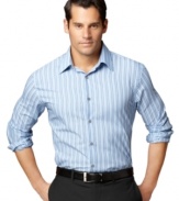 Go bold in blues. Standout style is effortless with this no-iron striped shirt from Van Heusen.