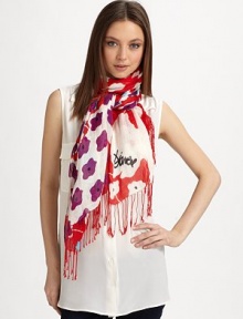 This gauzy, colorful style is patterned with a playful floral print and trimmed in fringe.51% viscose/49% linen25 X 70Dry cleanImported