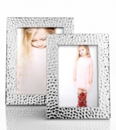 Shine on. This Martha Stewart Collection picture frame is positively radiant in hammered silver plate to complement any setting.