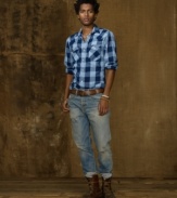 A classic plaid shirt is crafted in lightweight flannel, perfectly blending rugged Western appeal with heritage style.