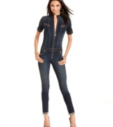 Take your street style seriously in Baby Phat's short-sleeve denim jumpsuit! Features skinny leg design and clean zip details that make this look unforgettable.