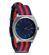 Nixon shows it's stripes with this nautical-inspired watch. A perfect fusion of performance and summer-right style, it flaunts a flexible a nylon bracelet, 100 meter water resistance, and custom colored oxide face.