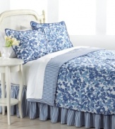 Into the blue. Soothing and serene, the Adeline comforter set from Lauren Ralph Lauren sets a refreshing tone with its garden of coordinating florals and striped bedskirt and reverse. Navy piping finishes the look with tailored distinction. (Clearance)