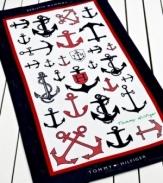 Tommy Hilfiger takes nautical inspiration to a new level in this Anchors beach towel, featuring a variety of anchors in different sizes, colors and patterns. Finish in a classic red, navy and white palette with the Tommy Hilfiger logo at each end.