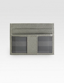 A translucent ID window on one side and iconic checks on the other: this slim and singular case is a traveler's dream.ID windowTwo card slotsPVC/Leather4½ x 3Made in Italy