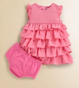 Sparkling sequins and a tiered ruffled skirt lend eye-catching style to this precious dress and bloomers set.Round necklineFlutter sleevesBack zipperTiered ruffled skirtPolyesterHand washImported Please note: Number of buttons may vary depending on size ordered. 