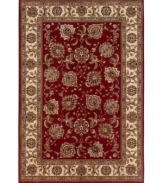 Inspired by classic Persian art and culture, this rug features an arresting color palette of burnt red and neutral hues and a beautiful, curvilinear floral pattern. Easy-care polypropylene ensures durability.