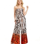 Take your bold style to the next level with this jumpsuit from XOXO that pairs palazzo-pants design with an extra-vivid print!