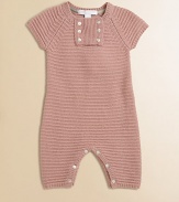 A classic one-piece crafted in luxe, knit cashmere with front and bottom button closure.CrewneckShort sleevesButton-frontBottom buttonsCashmereMachine washImported Please note: Number of buttons may vary depending on size ordered. 