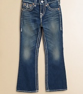 A dark-wash, five-pocket style is updated with whiskering, fading and bold, white topstitching in a bootcut silhouette.Front button closureAdjustable waistband with belt loopsZip flyFive-pocket styleCottonMachine washImported of domestic fabric