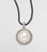From the Mooonlight Ice Collection. A lustrous white mabe pearl sits center with a dazzling, two-row diamond surround. White mabe pearlDiamonds, 1.36 tcwBlackened sterling silverSize, about ½Imported Please note: Chain sold separately.