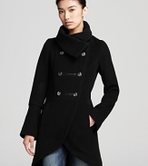 A tulip hem lends a touch of feminine flair to this military-inspired coat from Mackage.