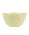 With fanciful beading and a feminine edge, this Lenox French Perle fruit bowl has an irresistibly old-fashioned sensibility. Hardwearing stoneware is dishwasher safe and, in a soft pistachio hue with antiqued trim, a graceful addition to any meal. Qualifies for Rebate