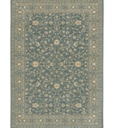 Cool and cordial, this sweet Karastan area rug welcomes you to the most comfortable spot in your home. A lane-blue ground is trimmed with soft beige patterns in a pleasing design inspired by antique English manor house rugs. Wool construction with cotton foundation for added strength and softness.