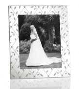 Detailed with diamond latticework, the silver-plated Petal Trellis picture frame lends everlasting romance to modern homes and special moments. A gift any couple will cherish. From Martha Stewart Collection.