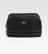 Never travel without this stylish, sophisticated accessory crafted in signature tessuto nylon.Zip closureNylon10W x 6H x 6DMade in Italy