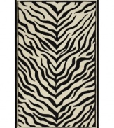 Nature-inspired designs lend beauty to the Utopia collection from Sphinx. Hand-tufted of fine wool, this lustrous rug's black and white zebra pattern is a gorgeous way to add sophisticated character to your home. With an ultrasoft hand for a blissful result.