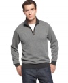 Knit in a birdseye pattern for subtle texture, this quarter-zip cotton sweater is a handsome, versatile pick. (Clearance)
