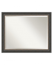 Capture the relaxed ambiance and incomparable charm of Italy's countryside with the Tuscan Rustic wall mirror. Beaded bronze trim separates the black wooden frame from beveled glass. The distressed finish and grand scale command attention in casual settings. Capture the relaxed ambiance and incomparable charm of Italy's countryside with the Tuscan Rustic wall mirror. Beaded bronze trim separates the black wooden frame from beveled glass. The distressed finish and grand scale command attention in casual settings.
