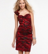 Jump's fitted party dress is ultra-chic with a sophisticated print that pairs well with sky-high heels. Pop it with a chunky crystal bracelet for some added glam!