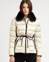 A plush fox fur collar elevates this quilted, sporty puffer style.Blue fox fur collarEpaulettesZip frontContrast pipingSide zip pocketsContrast side panelsMetal-tipped leather cord waist tieBack button tabsFully linedAbout 24 from shoulder to hemPolyesterImportedFur origin: FinlandModel shown is 5'10 (177cm) wearing US size Small. 