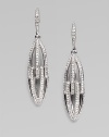 EXCLUSIVELY AT SAKS. Graceful elongated open ovals are set with sparkling crystals in this shimmering design.Crystal Rhodium plated Drop, about 1¾ Post-and-hinge back Imported