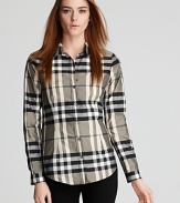 Burberry's classic check print is showcased on a tailored button down shirt from the brand of British cool.