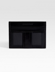 A slim look that slips easily into a jacket pocket, complete with credit cards slots on one side and a transparent ID window on the other. ID window Two credit card slots 4¼W X 3H Nylon/leather Imported 