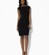 Knotted at the left hip for a glamorous twist, a sophisticated boatneck dress is designed in fluid stretch matte jersey for polished modern style.