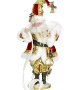 Making his list, checking it twice, Santa always knows who's been naughty or nice in this figurine from Mark Roberts.