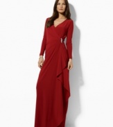 Slinky matte jersey creates an elegant drape on this long-sleeved petite dress from Lauren by Ralph Lauren, ornamented with a crystal-studded bar pin at the hip for sweeping old-Hollywood glamour.