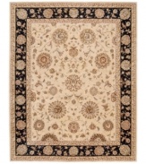 A great contrast to wood floors, this light-toned area rug dresses your home with warm beige color and delightful floral designs. Inspired by the opulent look and feel of Persian rugs, this gorgeous Nourison 2000 piece features a durable handcrafted construction that is sure to bring long-lasting allure to your home.