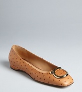 In a luxe ostrich embossed leather with distinctive logo accents, these flats are exotically Salvatore Ferragamo.