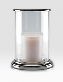 Gleaming glass and polished nickel is crafted to house a single pillar candle for a beautiful, ethereal effect.5¾ L x 8 HGlass and nickelImported Gleaming glass and polished nickel is crafted to house a single pillar candle for a beautiful, ethereal effect.5¾ L x 8 HGlass and nickelImported