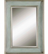 The wooden frame of the Ogden Blue mirror has a hand-rubbed ivory/sky blue finish with antiqued silver leaf details for a soft pastel color effect, perfect for informal settings where relaxation is encouraged. It also features beveled glass and can be hung vertically, as shown, or horizontally.