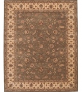 Expand beyond the standard borders of the room-size rectangle with the Nourison 2000 area rug collection. Classic in design, of the moment, while still boasting a chic sophistication, this rug features an intricate design of flowers in warm moss and taupe hues. Made of 100% silk and wool pile.