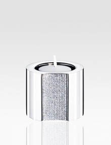 A stunning stainless steel tea light radiates timeless sophistication with an array of tiny, faceted clear crystals. Candles not included 2½H X 2 diam. Made in Austria 