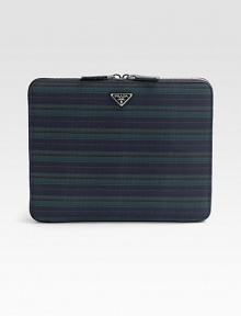 This sleek, compact case of signature tessuto nylon is crafted with inner padding to keep your iPad® secure.Zip-around closureEnamel triangle logoInterior pocketCalfskin leather lining10¼W x 8H x ¾DMade in Italy This sleek, compact case of signature tessuto nylon is crafted with inner padding to keep your iPad® secure.Zip-around closureEnamel triangle logoInterior pocketCalfskin leather lining10¼W x 8H x ¾DMade in Italy
