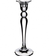 The light of your living room. With a curvaceous shape and sheer facets to reflect a gently flickering flame, this crystal candlestick is simply elegant in any decor. From Villeroy & Boch.