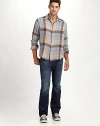 A dressed-down addition to any man's wardrobe, woven in cotton with earthtone checks and a slight slouch. ButtonfrontChest patch pocketCottonMachine washImported