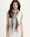 A luxurious blend of silk and cashmere with colorful folliage print. 50% silk/50% cashmereAbout 28 X 80Dry cleanImported 