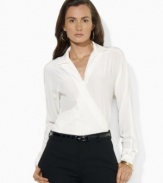 Lauren Ralph Lauren's soft silk wrap blouse is modernized for the season with dolman sleeves.