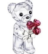 Already irresistible in faceted Swarovski crystal, this Kris Bear figurine extends a bouquet of red roses that'll win anyone's heart.