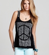A striped back provides a cool contrast on this Lauren Moshi tank, emblazoned with a peace sign.
