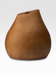 An organic statement of handcrafted style, carved from a single piece of sustainable mango wood by skilled artisans in Thailand. Decorative piece; not intended for water10 highMango woodWipe cleanHandcrafted in Thailand An organic statement of handcrafted style, carved from a single piece of sustainable mango wood by skilled artisans in Thailand. Decorative piece; not intended for water10 highMango woodWipe cleanHandcrafted in Thailand