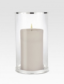 Elegant in its simplicity, a crystal column with silver-plated accents is ready to shed softly glowing candlelight. Candle not included 11H X 6D Imported Elegant in its simplicity, a crystal column with silver-plated accents is ready to shed softly glowing candlelight. Candle not included 11H X 6D Imported