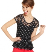 Crafted from lace and boasting a femme peplum hem, this polkadot top from Fresh Brewed is all about girl power!