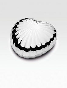This elegant fluted heart-shaped box takes its name from the little boxes made to hold fine chocolates but it has many other uses - for jewelry, tiny keepsakes or as a gleaming decorative accent.Stainless steel 2¼H X 4¾W Dishwasher safe Imported This elegant fluted heart-shaped box takes its name from the little boxes made to hold fine chocolates but it has many other uses - for jewelry, tiny keepsakes or as a gleaming decorative accent.Stainless steel 2¼H X 4¾W Dishwasher safe Imported